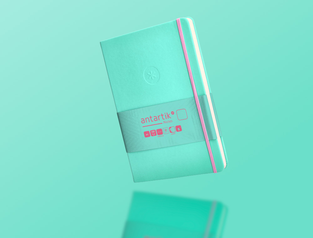 CUADERNO CON GOMILLA ANTARTIK NOTES TAPA DURA A5 HOJAS LISAS ROSA Y TURQUESA 100 HOJAS 80 GR FSC